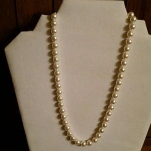 STRAND OF PEARLS